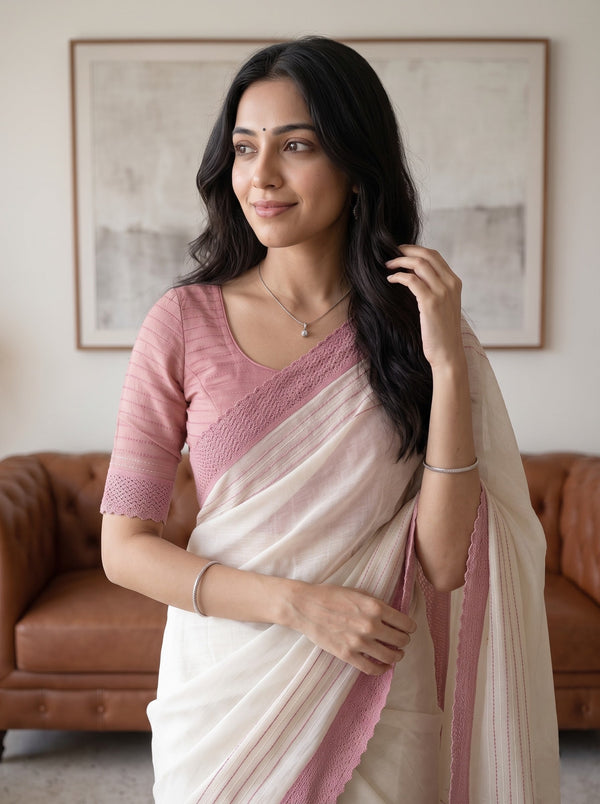 Net Kota Off White Saree with Pink Striped Pattern and Floral Motif Pallu with Textured Pink Border