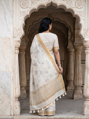 Semi Tussar Cream Saree with Floral Motifs and Golden Zari Border