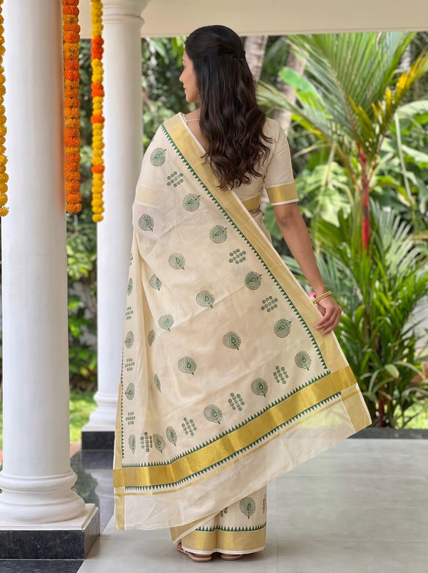 Tissue Cream Kerala Saree with Green Paisley Motif Pallu and Temple Border