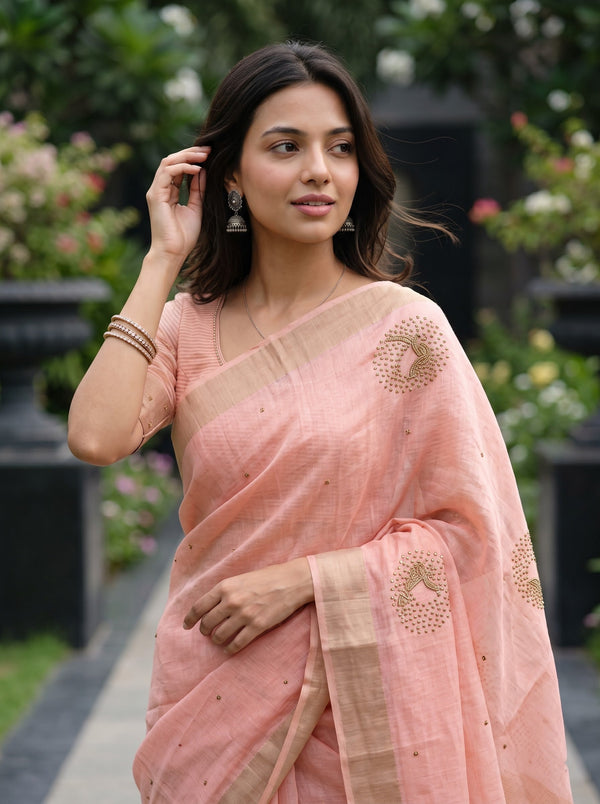 Linen Peach Saree with Golden Beaded Medallion Motifs and Tasseled Border