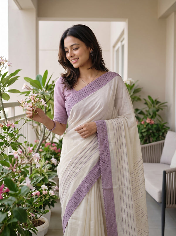 Net Kota Off White Saree with Lavander Striped Pattern and Floral Motif Pallu with Textured Lavander Border