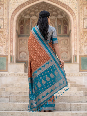Semi Silk Burnt Orange Checkered Peacock Blue Paisley Saree