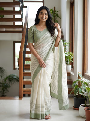 Net Kota Off White Saree with Green Line Pattern and Floral Motif Detail with Green Border Pallu