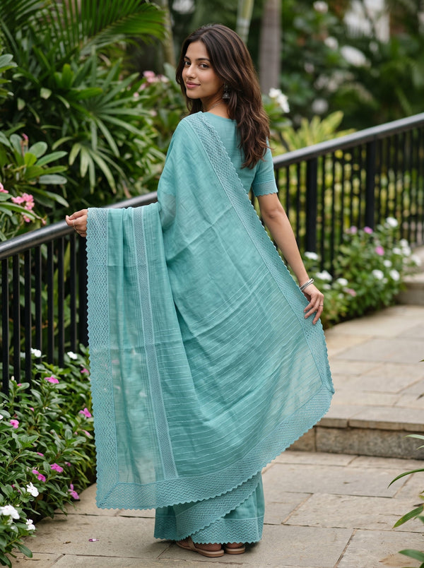 Cotton Linen Teal Saree with Woven Stripe Details and Intricate Lace Border
