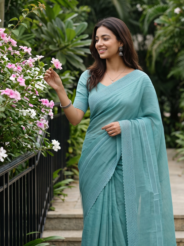 Cotton Linen Teal Saree with Woven Stripe Details and Intricate Lace Border