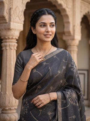 Matka Silk Black Saree with Woven Dandelion Print and Tassels