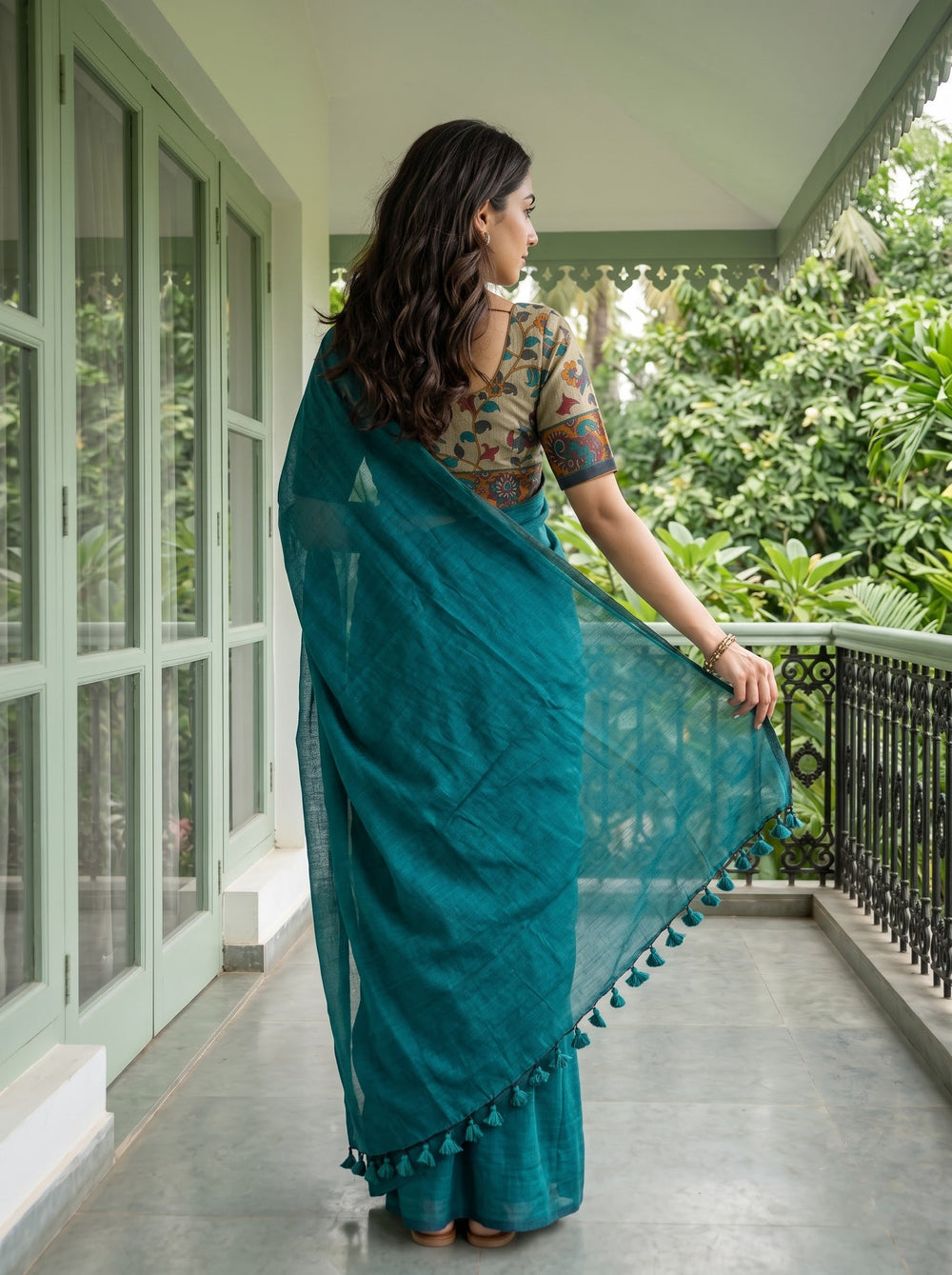 Cotton Teal Green Saree with Teal Tassels and Floral Print