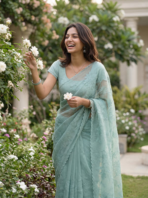 Net Kota Saree in Aqua Green with All-Over Floral Embroidery and Scalloped Border