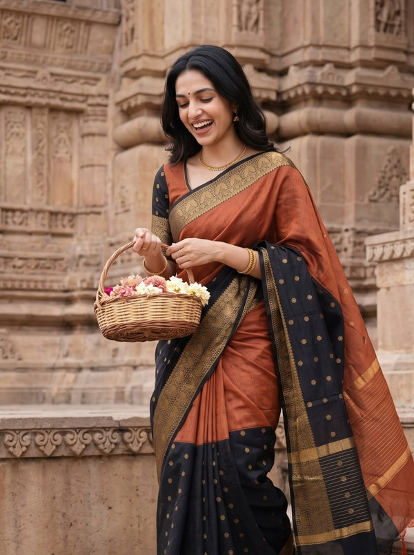 Semi Silk Half-and-Half Black Orange Saree with Golden Paisley Border