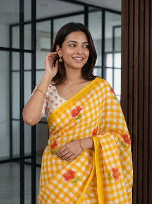Cotton Saree in Yellow-Orange Gingham Check with Red Hibiscus Print