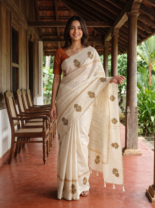 Semi Tussar Silk Cream Saree with Floral Embroidery border and Tassel Detailing