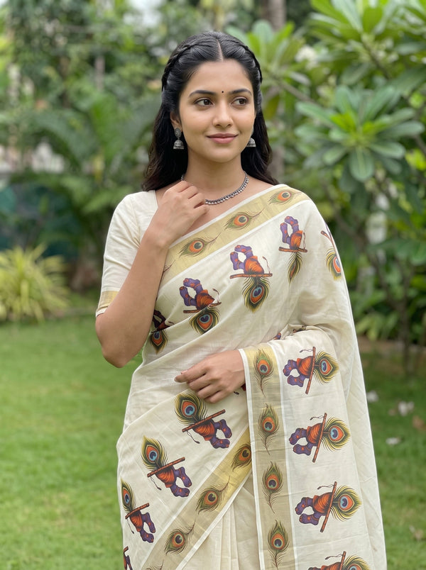 Tissue Cream Kerala Saree with Krishna Peacock Feather Print Pallu and Golden Zari Border