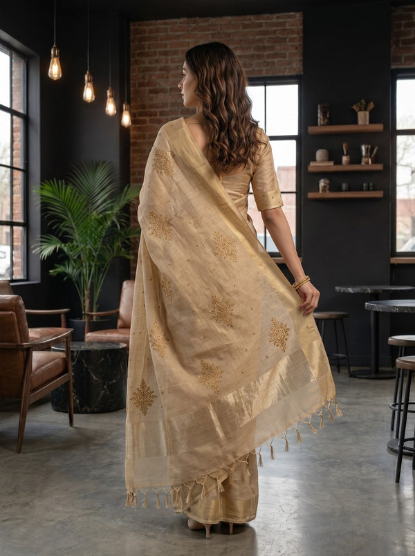 Linen Beige Saree with Golden Beadwork Floral Vine Motifs and Tasseled Pallu