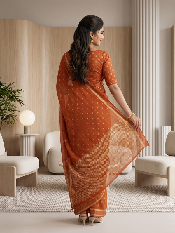 Chiffon Saree in Burnt Orange with Scattered Zari Motifs