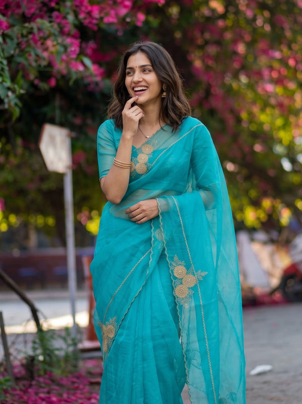 Organza Peacock Blue Saree with Golden Zari Rosette Border