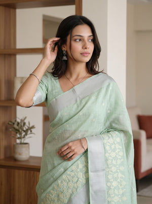 Semi Tussar Sage Green Saree with Cream Floral Vine Border