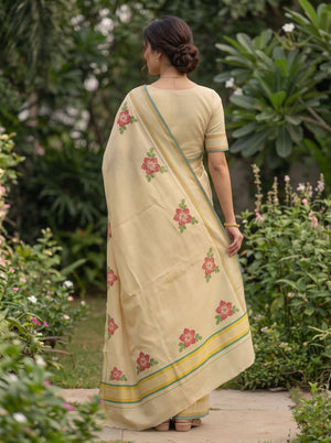 Tissue Cream Kerala Saree with Red Floral Print Pallu and Golden Zari Checks