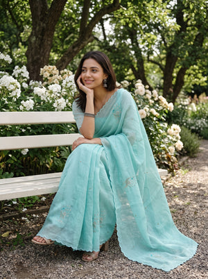 Linen Mint Beaded Peacock Motif Saree with Scalloped Border