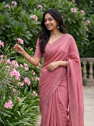 Cotton Linen Coral Pink Saree with Lace Border and V-Shaped Lace Detailing In pallu