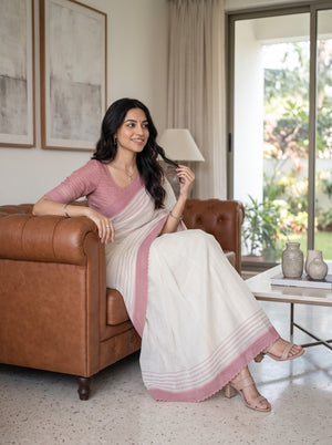 Net Kota Off White Saree with Pink Striped Pattern and Floral Motif Pallu with Textured Pink Border