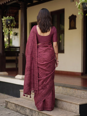 Semi Tussar Maroon Self Stripe Embroidered Floral Saree with Tassels