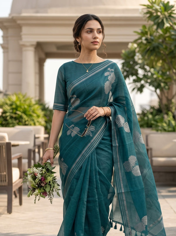 Organza Teal Self-Tone Botanical Motif Saree with Striped Pallu Border and Tassels